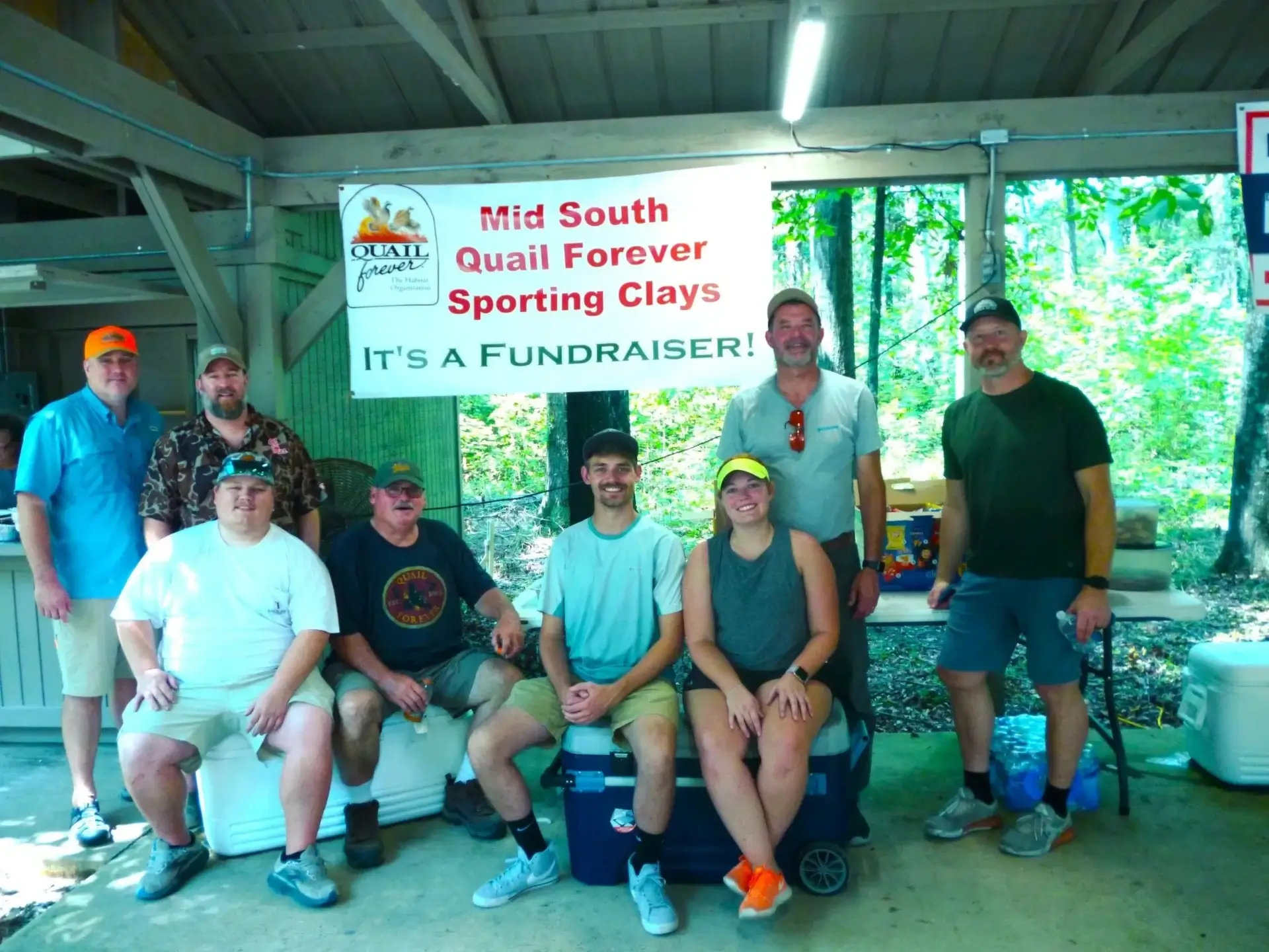Group posing at sporting clays fundraiser event.